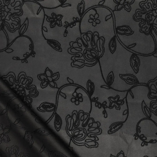 Washed embroidery vegan leather